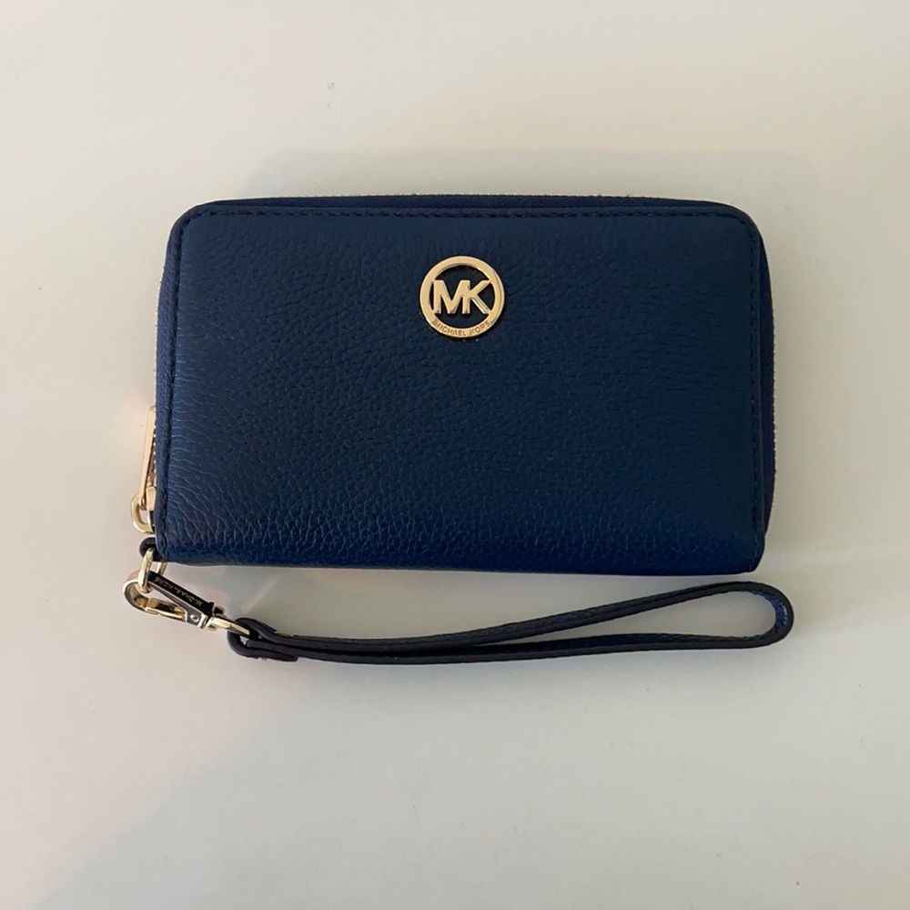 Michael Kors navy wallet. Never used.